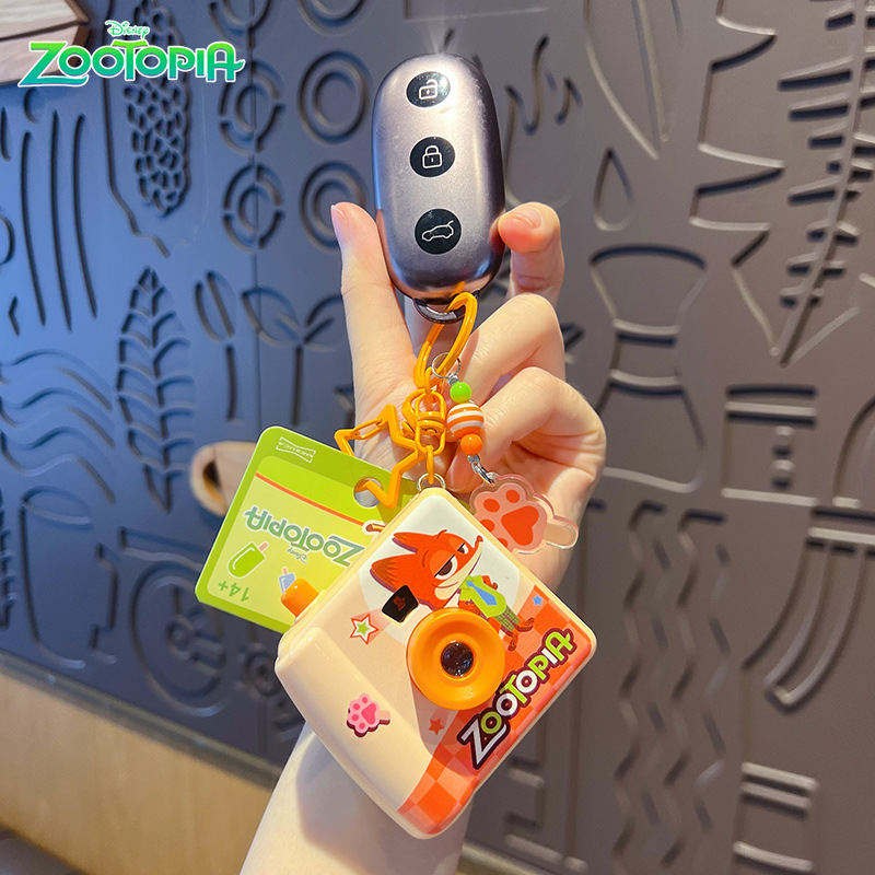 オリジナルズートピアポラロイドカメラキーホルダークリエイティ - Party Games Kids のレビューと価格